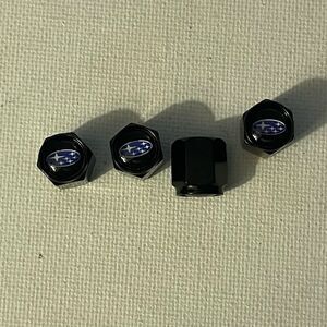Subaru logo valve Stem caps in black set of 4 NWT